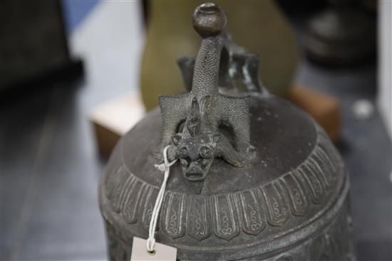 A Chinese bronze temple bell, Qing dynasty, 36cm